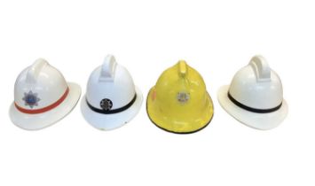 Group of four Fire Brigade helmets including Suffolk Fire Service and Liverpool Salvage Corps (4).