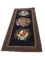 1934 hand-embroidered wool cross stitch tapestry panel, flowers on black ground, signed E H G 1934