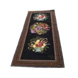 1934 hand-embroidered wool cross stitch tapestry panel, flowers on black ground, signed E H G 1934