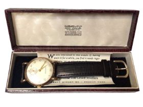 1950s Garrard 9ct gold cased wristwatch on leather strap, in orginal box