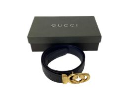 Gucci black leather waist belt, with gilt metal 'GG' logo buckle, in a Gucci box