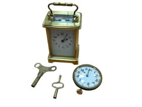 French brass cased carriage clock with key, and a travel clock