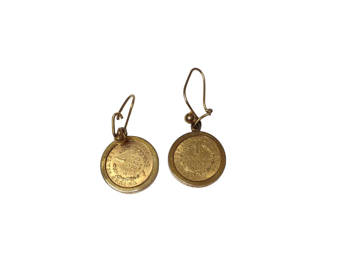 Pair of 19th century American 1 Dollar coins, 1853, in gold earring mounts