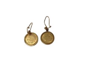 Pair of 19th century American 1 Dollar coins, 1853, in gold earring mounts