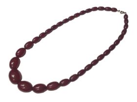 Simulated cherry amber graduated oval bead necklace