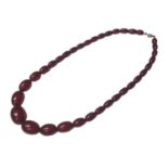 Simulated cherry amber graduated oval bead necklace