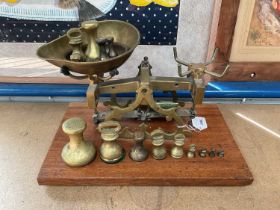 Set brass shop scales with weights on base