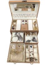 Jewellery box containing a silver locket on chain, silver bangle and other costume jewellery