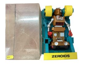 Zeroids robot in perspex case.
