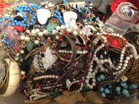 Quantity of costume jewellery, mostly bead necklaces and bangles
