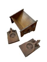 Arts and Crafts period oak ecclesiastical bookends in the Gothic style, together with oak arts and c