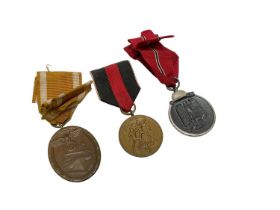 Three Nazi War Medals comprising West Wall Medal, Sudetenland Medal and Eastern Front medal (3)