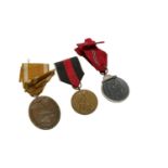 Three Nazi War Medals comprising West Wall Medal, Sudetenland Medal and Eastern Front medal (3)