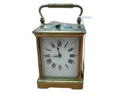 Old brass repeating carriage clock striking on gong with key 16cm