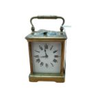 Old brass repeating carriage clock striking on gong with key 16cm