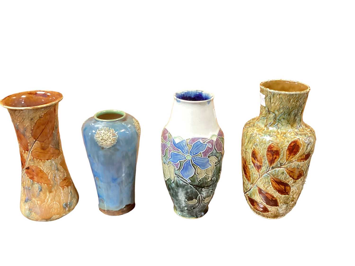 Four Royal Doulton stoneware vases, tallest is 26cm high