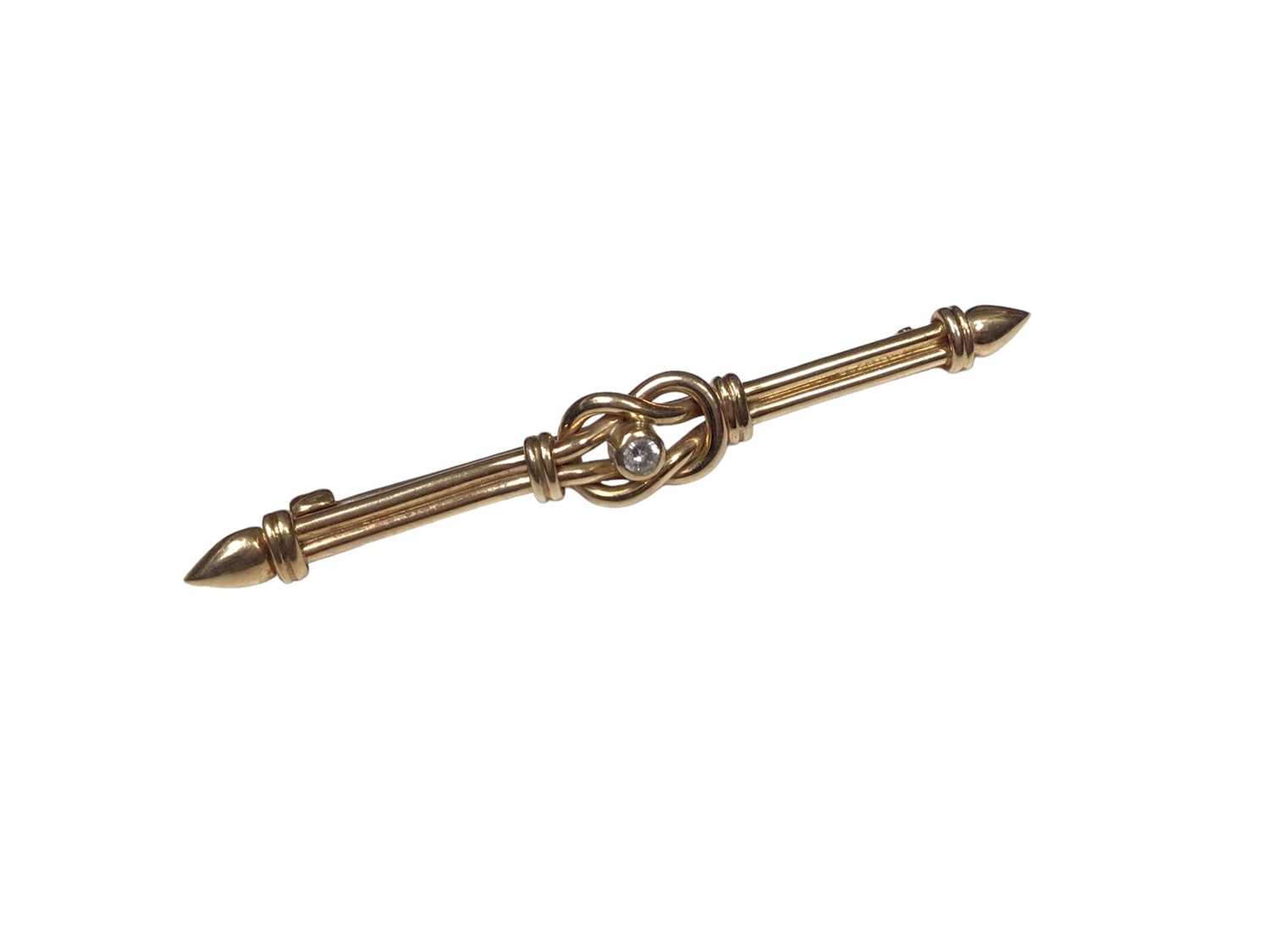 Edwardian style 9ct gold and diamond bar brooch with lovers knot design