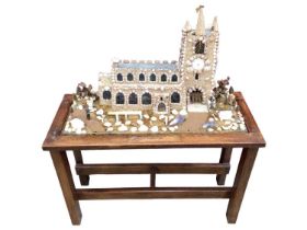 Old shell model of a church in glazed cabinet