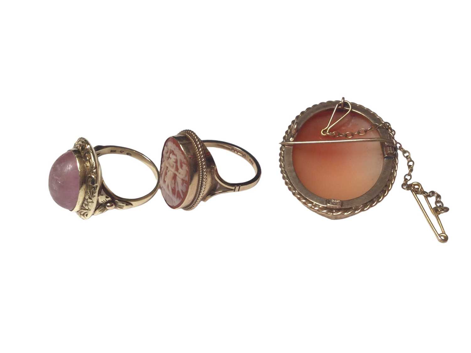 14ct gold rose quartz cabochon ring in a floral scroll engraved mount, together with a 9ct gold carv - Image 2 of 3