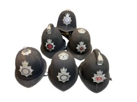 Group of six Elizabeth II Police helmets to include British Transport Police, Nottinghamshire Consta