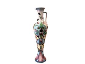 Moorcroft M.C.C vase with floral decoration on multi coloured ground, numbered 3 of 3, dated 2010, 3