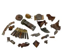 Collection of Second World War shrapnel to include incendiary bomb tail fin and bullet cases.