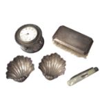 Pair of Edwardian silver shell salts, silver cased desk clock, silver backed brush and a silver and