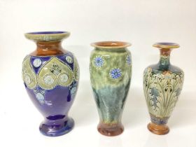 Three Royal Doulton stoneware vases on green and blue ground, tallest is 28.5cm high