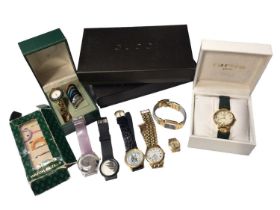 Gucci gold plated ladies wristwatch with interchangeable bezels, boxed, together with a group of oth