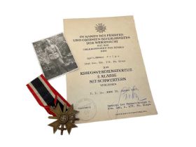 Nazi War Merit Cross Second Class with swords with original citation dated January 1943 ( awarded to