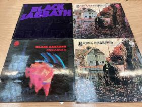 Vintage case of LP records including Black Sabbath, Kate Bush, Manfred Man, Motorhead, Mungo Jerry,