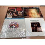 Vintage case of Queen LP's and 12 inch singles