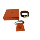 Hermès reversible Swift calfskin and Epsom calfskin leather belt, in black and brown, with a gilt me