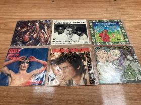 Box of 7" picture sleeves (45s), including Iggy and the Stooges, Pet Shop Boys, Fun Boy Three, etc