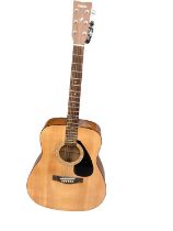 Yamaha F310 acoustic guitar in case