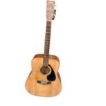 Yamaha F310 acoustic guitar in case