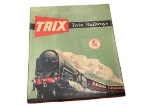 Trix Railway TTR, E. R. Passenger F24 set boxed, plus two Hornby Dublo coaches also boxed.