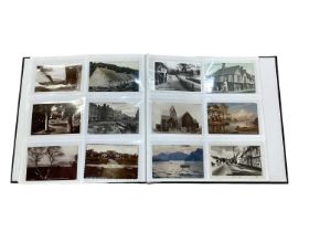 Postcards in large album including shipping, topographical, colliery, street scenes etc. (300)