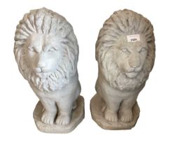 Pair of grey painted concrete garden statues of lions, 50cm high