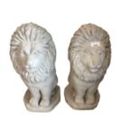 Pair of grey painted concrete garden statues of lions, 50cm high