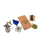 Nazi German Faithful Service Decoration (25 years), together with paper envelope, a Nazi War Merit m