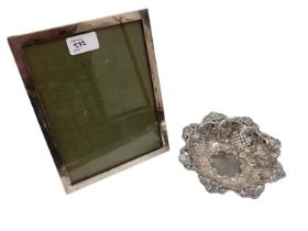 Victorian silver bonbon dish, (Chester 1897) together with a silver photograph frame (2).