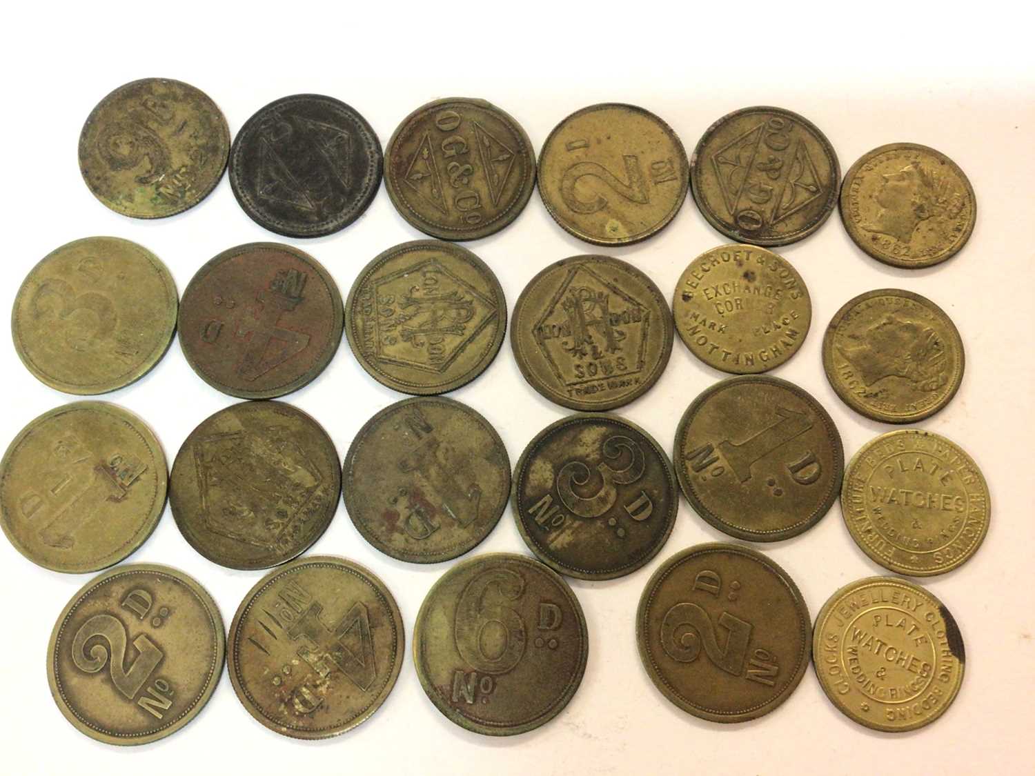 G.B. - Mixed brass tokens to include various denominations for R.H. London & Sons x 13, OG & Co x 5,