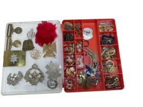 Collection of British military cap badges, buttons and rank insignia to include RAF, Essex Regiment