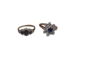 Sapphire and diamond cluster ring with triangular cut diamonds in 9ct gold setting, and a sapphire a
