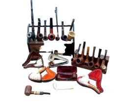 Collection of smoking pipes and accessories