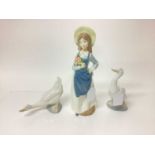 Two Nao porcelain geese, Lladro style figure of a girl holding flowers, selection of Murano glass sw