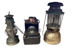 Brass Tilley lamp, LNER railway lamp and one other (3).