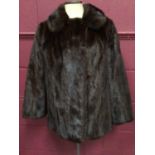 Dark brown mink jacket.