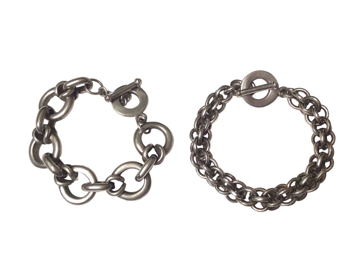 Two contemporary silver link bracelets, both with T-bar fittings